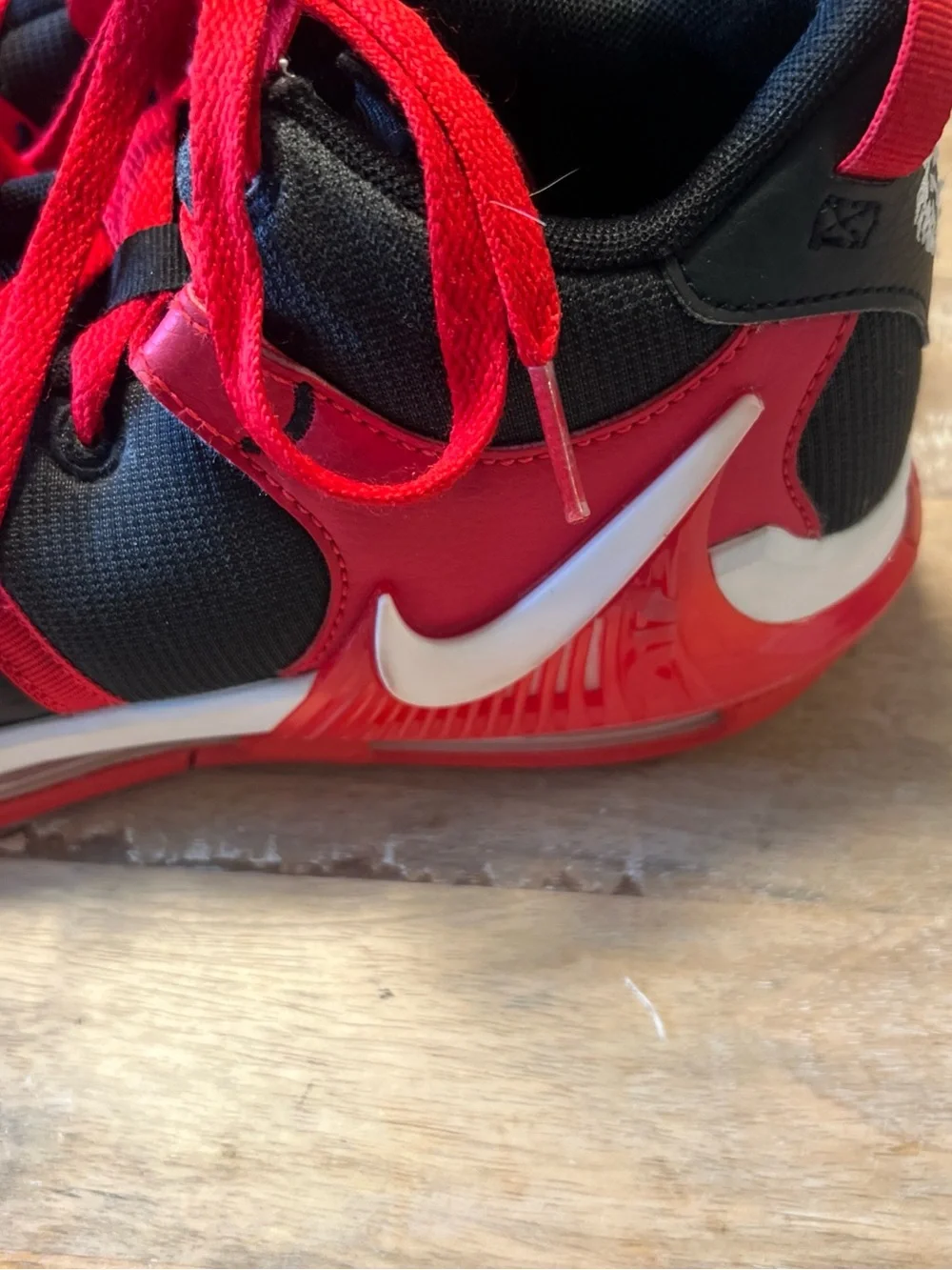Nike Kids Black and Red Athletic Sneakers with White Swoosh (LeBron witness 7 )